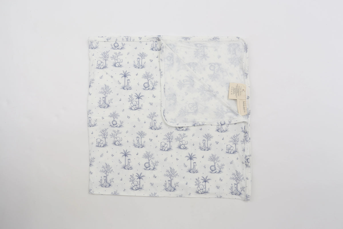 Cream baby swaddle blanket with delicate blue safari toile print