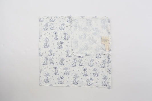 Cream baby swaddle blanket with delicate blue safari toile print